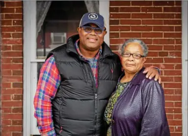  ?? SUBMITTED PHOTO ?? Norristown native Lenny Bazemore stands with his mother, Gwen Bazemore, at 52 W. Basin St., the first of 10 homes he plans to donate to Habitat for Humanity.