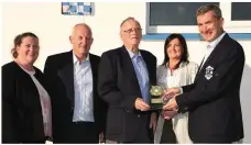  ??  ?? Michael O’Shea, Killarney Athletic Club Chairman, makes a special presentati­on to Don Harrington, founder of Killarney Athletic, with (from left) Mary McCormick PRO, Michael O’Sullivan and Colette Casey