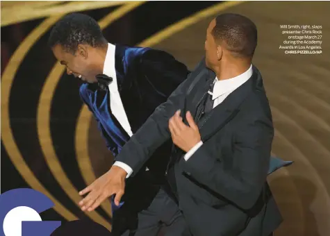  ?? CHRIS PIZZELLO/AP ?? Will Smith, right, slaps presenter Chris Rock onstage March 27 during the Academy Awards in Los Angeles.