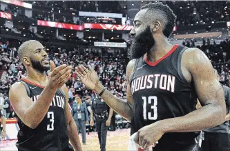  ?? ERIC CHRISTIAN SMITH
THE ASSOCIATED PRESS ?? Rockets guard Chris Paul, left, and James Harden celebrate the team’s win over the Utah Jazz during Game 5 of their NBA second-round playoff series Tuesday in Houston.