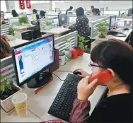  ?? YAO LIN / FOR CHINA DAILY ?? Staff deal with online medicine sales at a drug store in Changzhi, North China’s Shanxi province.