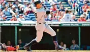  ?? Jason Miller/Getty Images ?? Aaron Judge of the New York Yankees watches a three run homer during the third inning against the Cleveland Guardians at Progressiv­e Field on Sunday.