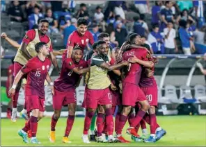  ??  ?? Qatar players celebrate making the quarter-finals of CONCACAF Gold Cup on their debut at the BBVA Stadium in Houston, Texas, on Tuesday. Qatar won 2-0 to top Group D.