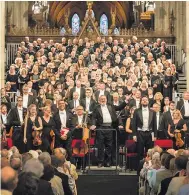  ??  ?? Moving: conductor Martyn Brabbins and the Three Choirs in Worcester Cathedral