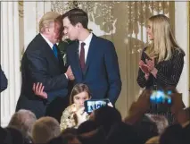  ?? DOUG MILLS / THE NEW YORK TIMES FILE (2017) ?? President Donald Trump speaks with his son-in-law and senior adviser, Jared Kushner, who is married to Trump’s daughter Ivanka, right, during 2017 a reception at the White House. Trump’s ascension to the White House has drawn scrutiny from...