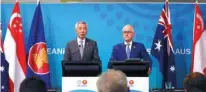  ?? - Reuters ?? JOINT COMMUNIQUE: Australian Prime Minister Malcolm Turnbull stands with Prime Minister of Singapore Lee Hsien Loong during their media conference during the one-off summit of 10-member Associatio­n of Southeast Asian Nations (Asean) in Sydney,...