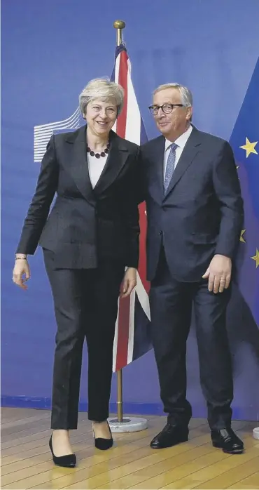  ??  ?? 0 Theresa May and EU Commission president Jean-claude Juncker after a briefing in Brussels.