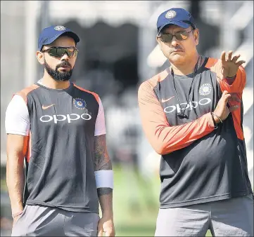  ??  ?? India head coach Ravi Shastri (right) and captain Virat Kohli during training at Lord's Cricket Ground in London on Tuesday.