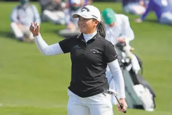  ?? David J. Phillip / Associated Press ?? Tsubasa Kajitani of Japan celebrates after beating Emilia Migliaccio on the first playoff hole to win the Augusta National Women's Amateur tournament at Augusta (Ga.) National Golf Club.