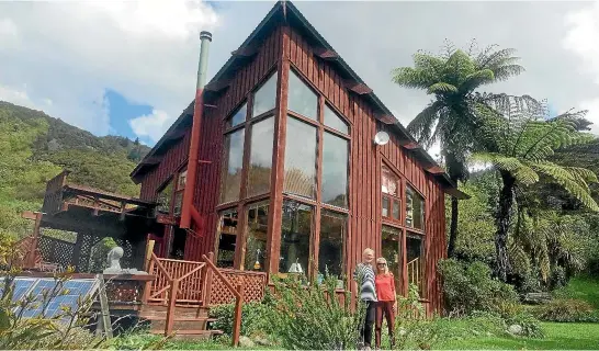  ??  ?? Judith Hoch and husband John McKie at their Wainui Bay home, where weka are allowed to roam free. A career anthropolo­gist, Judith’s latest book is about her personal journey to discover the spirit of Waitaha.