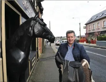  ??  ?? Tom Quane pictured outside Quane’s Bar, Blennervil­lie. Photo by Domnick Walsh