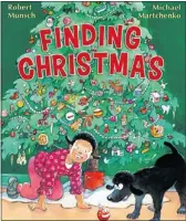  ??  ?? Finding Christmas, written by Robert Munsch and illustrate­d by Michael Martchenko.