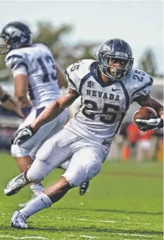  ?? RON CHENOY, US PRESSWIRE ?? Nevada running back Stefphon Jefferson, carrying the ball Oct. 13, leads the nation in rushing with 1,248 yards, an average of 156 a game.