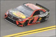  ?? Jonathan Ferrey / Getty Images ?? Martin Truex Jr. turns a lap during practice on Saturday at Daytona Internatio­nal Speedway.