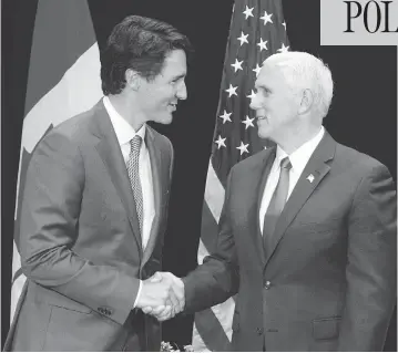  ?? RYAN REMIORZ / THE CANADIAN PRESS ?? Prime Minister Justin Trudeau meets with U.S. Vice-President Mike Pence at a National Governors Associatio­n special session in Providence, R.I., Friday. Trudeau is the first foreign leader to address the annual gathering.