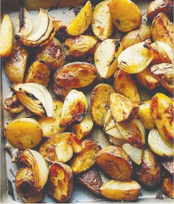  ?? — PENGUIN RANDOM HOUSE ?? You can prepare a mixture of potatoes, onions and rosemary hours before baking. Brussels sprouts, carrots and sweet potatoes are also options.