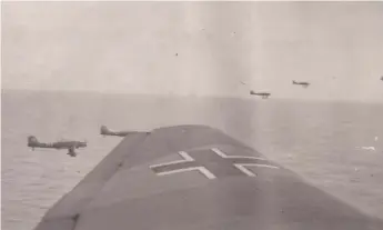  ?? ?? Above After a raid on Britain, a group of Junkers 87 Stukas heads back across the English Channel.