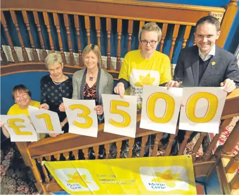  ??  ?? A BRAVE group of fundraiser­s in Dundee went “over the top” for charity.
The roof of Dundee University’s dental hospital was the venue for a sponsored abseil to benefit Marie Curie nurses.
The organisers of the event thanked all those who took part...