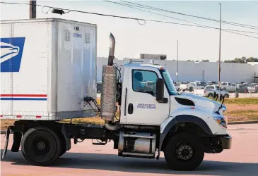  ?? Melissa Phillip/Staff photograph­er ?? A U.S. Postal Service truck leaves the North Houston Processing and Distributi­on Center on Jan. 31.