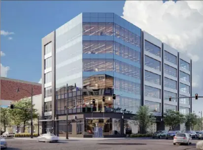  ?? AE7 architectu­ral firm ?? Highwoods Properties, the owner of PPG Place in Downtown, is planning a six-story office building on Penn Avenue in East Liberty across from Target.