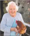  ??  ?? May MacKinnon with one of her new hens thanks to Crossroads North Argyll.