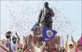  ?? VIRENDRA SINGH GOSAIN/HT PHOTO ?? People celebrate on the occasion of BR Ambedkar’s 127th birth anniversar­y at Dalit Park, Noida, on Saturday.