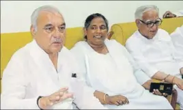  ??  ?? Former chief minister Bhupinder Singh Hooda (left) addressing a press conference at his residence in Rohtak on Tuesday. MANOJ DHAKA/HT