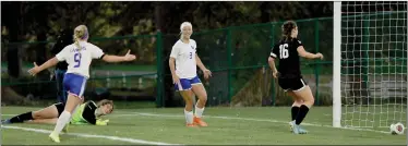  ?? PILOT PHOTO/RUDY MARQUEZ ?? Laville’s Kassi Watts (3) smiles after a goal as teammate Kylie Gorka (9) runs to congratula­te her.