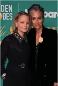  ?? BILD: JORDAN STRAUSS ?? Jodie Foster med hustrun Alexandra Hedison på Golden Globe-galan.
