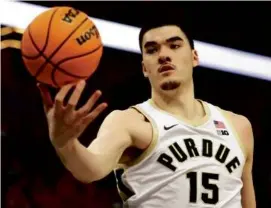  ?? DAVID BERDING/GETTY IMAGES ?? Zach Edey and Purdue are looking to have a ball in this NCAA Tournament after a first-round loss as a 1-seed last year.