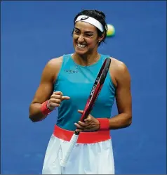  ?? SETH WENIG / ASSOCIATED PRESS ?? Caroline Garcia of France reacts after defeating Karolina Pliskova of the Czech Republic during Wednesday’s second round of the U.S. Open in New York. Garcia is now 4-3 overall against Pliskova.