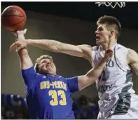  ?? (Arkansas Democrat-Gazette file photo) ?? Justus Cooper (right) and Izard County have won 59 games in a row over Class 1A teams. Guy-Perkins was the last 1A school to defeat Izard County, a loss in the 2018 state championsh­ip game.