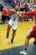  ?? GREGG SLABODA — TRENTONIAN PHOTO ?? Trenton Catholic Academy’s Kaela Reed drives to the basket against Rancocas Valley.