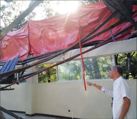  ?? Photo) (Serge Santillan/RMN DYHB-Bacolod ?? Negros Occidental Vice Governor Eugenio Jose Lacson inspected damage following an incident involving the Mambukal Convention Center and Hotel earlier this week. According to a witness, a tree branch struck the building’s parapet, or the extension of a wall along the edge of a roof, causing the roof of the kitchen area to collapse.