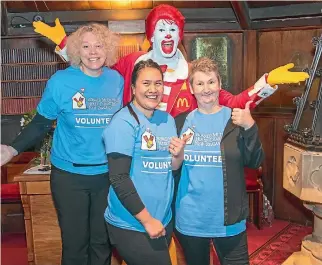  ??  ?? Ronald McDonald with volunteers at Wellington’s RMH Supper Club fundraiser last week.