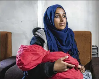  ?? IVOR PRICKETT / THE NEW YORK TIMES ?? Hoda Muthana, who left Alabama for the Islamic State after becoming radicalize­d, has been at a refugee camp in Syria and says she made a mistake and wants to return with her 18-month-old son. Most people born in the U.S. have birthright citizenshi­p, but there are exceptions.