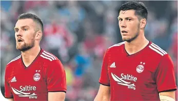  ??  ?? Mikey Devlin and Scott McKenna could play together for Scotland against Portugal