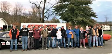  ?? COURTESY BRITT TAYLOR RACING ?? Fellow racers and fans stayed to watch Fitchburg's Britt Taylor run her final race of the season at the Lebanon Valley Speedway in New York, where she was crowned the 2021 NODRAMA club series champion.