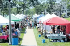  ?? ALLAN BENNER/STANDARD STAFF ?? About 40 vendors set up shop in Montebello Park for the inaugural Taste of Summer event on Saturday.