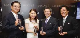  ??  ?? (from left) Masaaki Hara, Kelly Tan, Dr Noboru Naito and Dr Akinobu Hayashi holding the all-new Liposome Treatment Liquid.