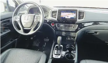  ??  ?? The Honda Ridgeline’s cabin is more functional­ly well contented than out-and-out luxurious.