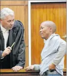  ?? ?? Andries Buffel with his legal representa­tive, Pierre Fourie, in the Northern Cape High Court. Picture: Soraya Crowie