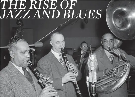  ?? WILLIAM P. GOTTLIEB/LIBRARY OF CONGRESS PHOTOS ?? Some fine Dixieland tootin’ was done at the “This is Jazz” bash in New York in 1947 with Albert Nicholas, from left, Mezz Mezzrow and Sy Sinclair.