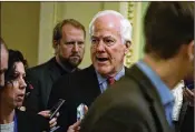  ?? ALEX WONG / GETTY IMAGES ?? U.S. Senate Majority Whip John Cornyn, R-Texas, speaks to reporters outside the Senate chamber in Washington, D.C., on Wednesday.