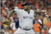  ?? DAVID J. PHILLIP - THE ASSOCIATED PRESS ?? File- This Oct. 21, 2017, file photo shows New York Yankees starting pitcher CC Sabathia throwing during the first inning of Game 7 of baseball’s American League Championsh­ip Series in Houston. Sabathia’s $10 million, one-year contract has been...