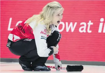  ??  ?? Team Canada skip Jennifer Jones calls to her sweepers during acton against Sweden at the women’s world curling championsh­ip Wednesday in North Bay, Ont.