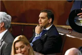  ?? THE NEW YORK TIMES ?? Rep.-elect George Santos (R-N.Y.) sits alone as members of Congress gather in the House Chamber on Jan. 3. Two Democrats are filing an official complaint about Santos’ financial disclosure­s with the House ethics committee.