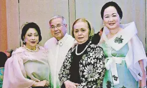  ??  ?? Philippine Ambassador to the Court of St. James Tonet Lagdameo is flanked by wife Linda, Nene Quimson and author Frannie Jacinto.
