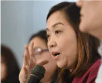  ?? AFP ?? Ching Santos, general manager of Sanofi Pasteur, gestures as she speaks during a press conference in Manila on Monday. —