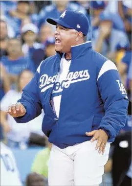  ?? Wally Skalij Los Angeles Times ?? DAVE ROBERTS has some sorting out to do with the Dodgers’ starting rotation and its crowded outfield. “It’s going to be a competitio­n,” he says.